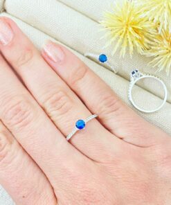 P1-14 ANEL SOLITARIO CRAVEJADO AZUL  ANI1358 1.1g LOTE 19