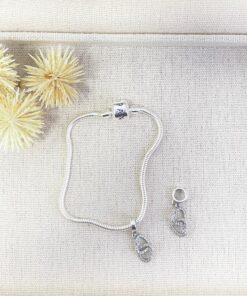 D6-65 Berloque PESO APROXIMADO 1,05g L18