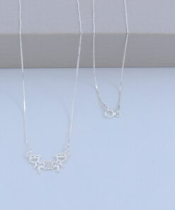 B3-28 COLAR DOIS MENINOS PESO APROXIMADO 1,8g LOTE 17