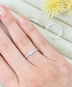 P1-13 ANEL SOLITARIO CRAVEJADO ANF64  1g LOTE 19